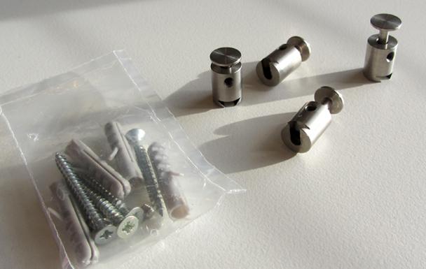 Set 4 stuks rvs afstandhouders incl. pluggen en schroeven